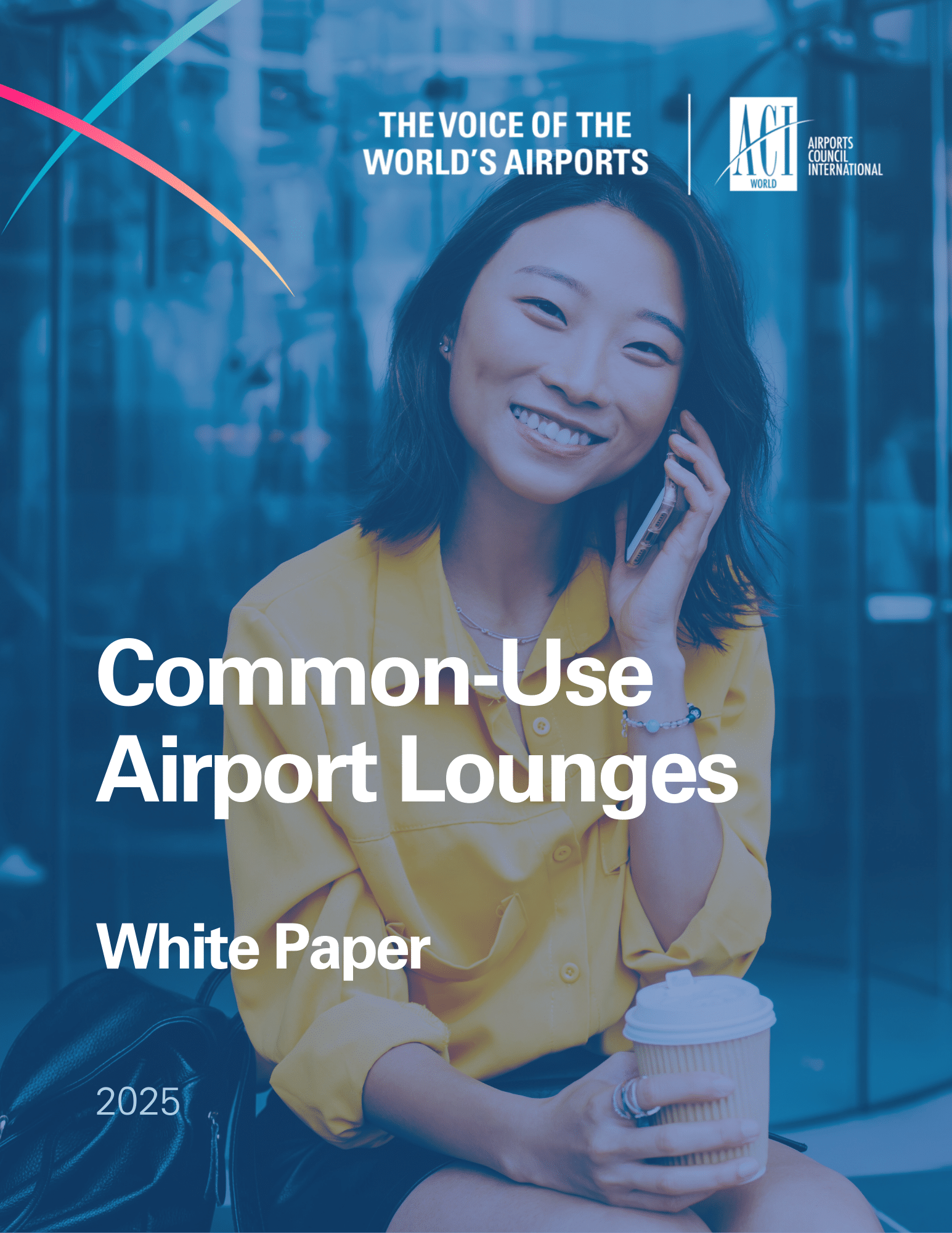 A woman in a yellow shirt smiles while talking on her phone. The image features the ACI World and Airports Council International logos and text: Common-Use Airport Lounges White Paper 2025.