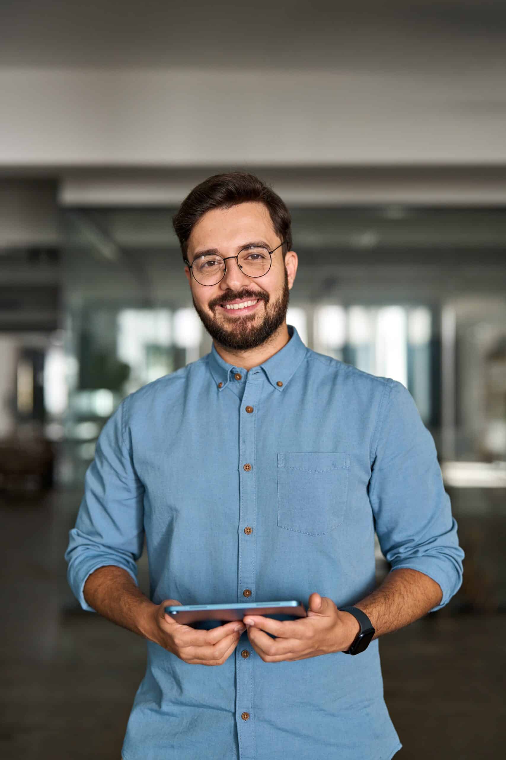 Happy,Young,Professional,Latin,Business,Man,Looking,At,Camera,Standing