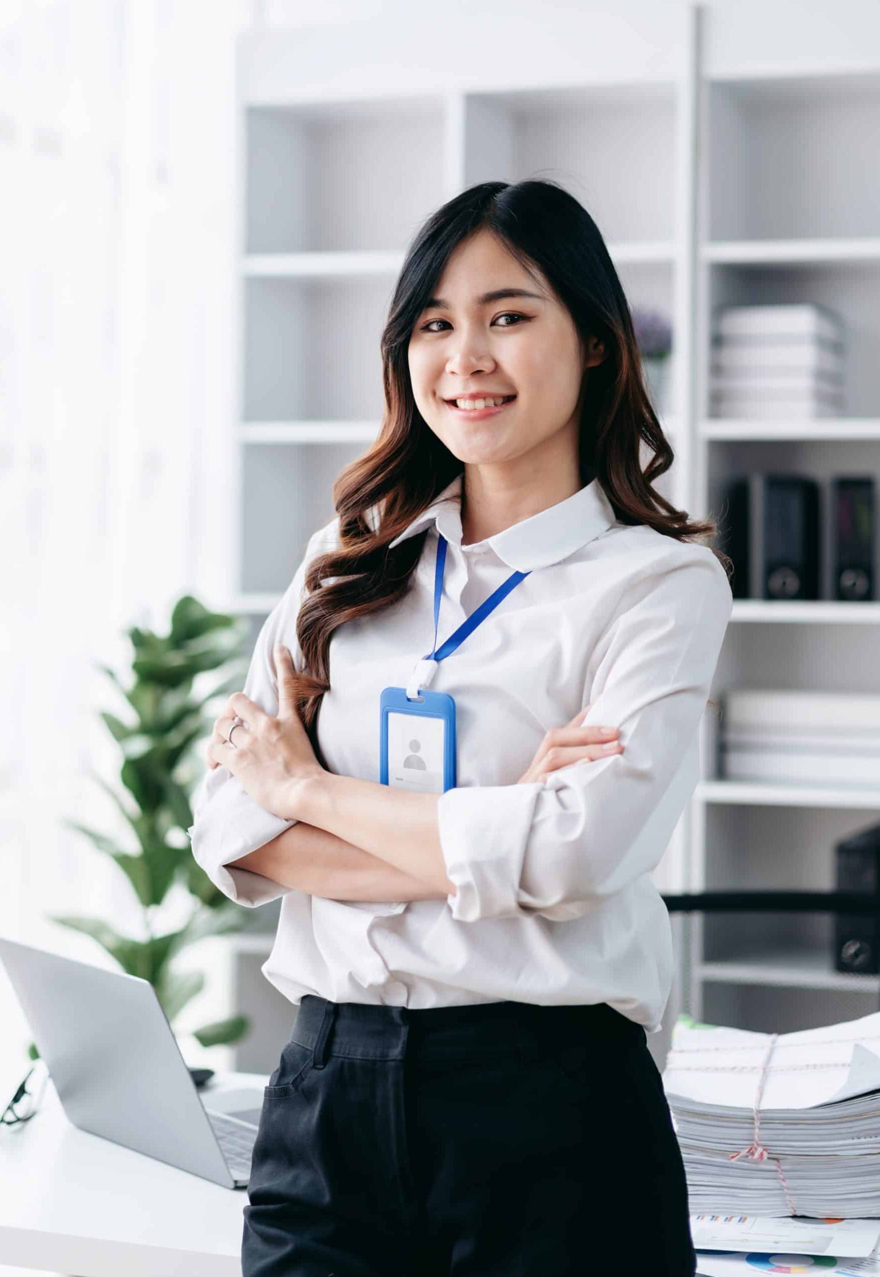 A,Woman,In,A,White,Shirt,And,Black,Pants,Is
