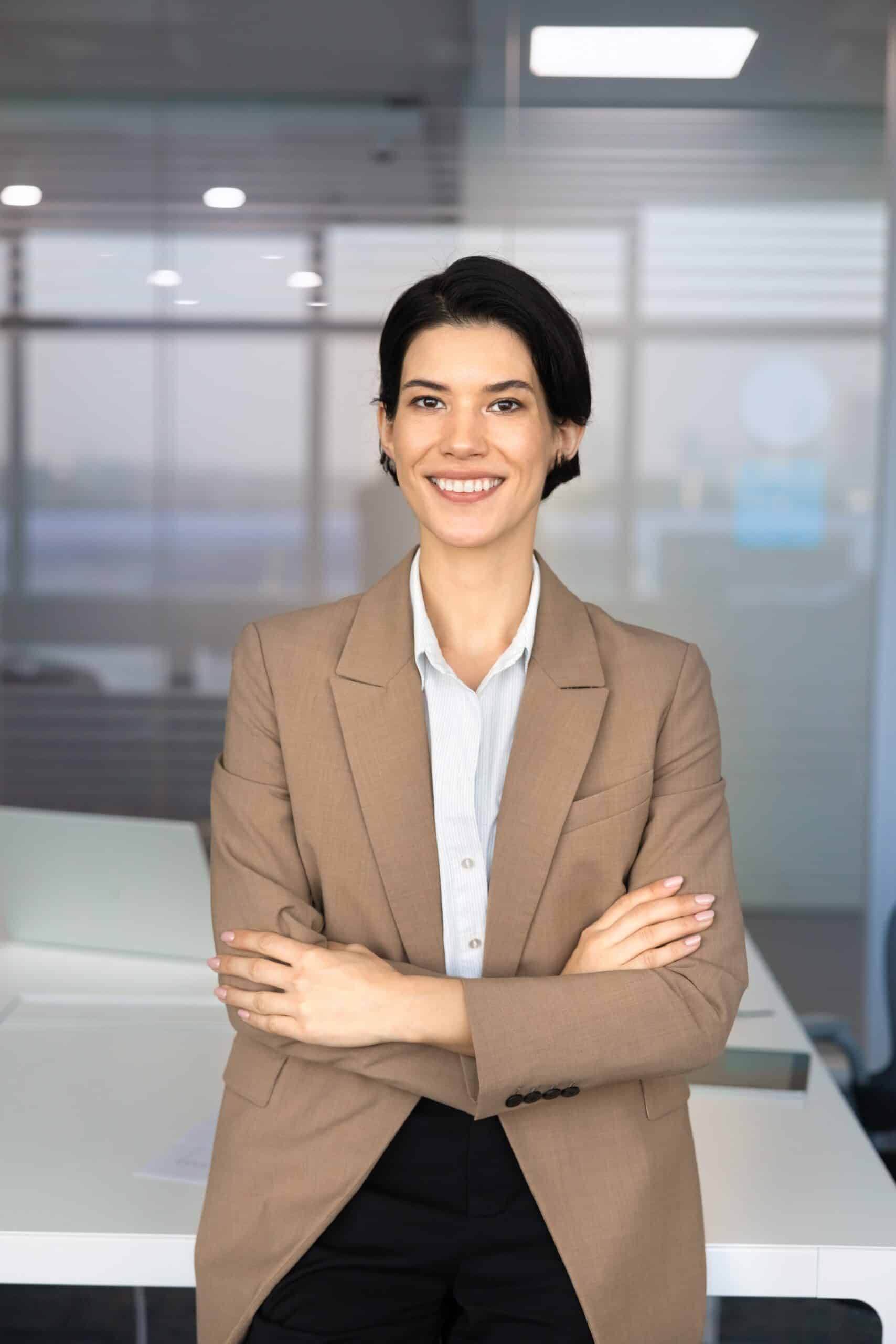 Portrait,Of,Smiling,Caucasian,Businesswoman,,Corporate,Staff,Member,Posing,In